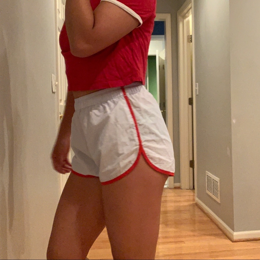 Urban Outfitters white gym shorts with red stripe